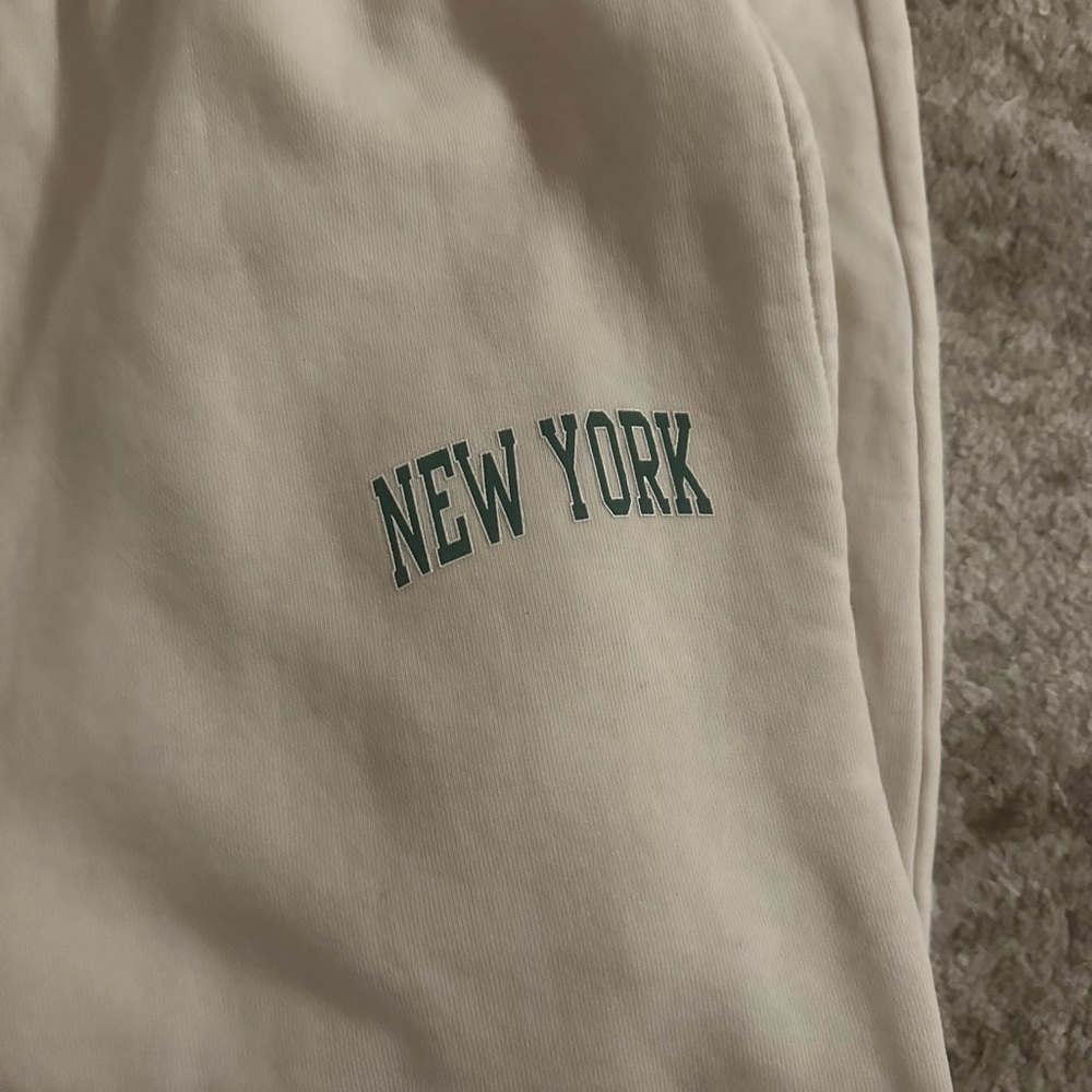Brandy Melville Cream Pants with Green Print